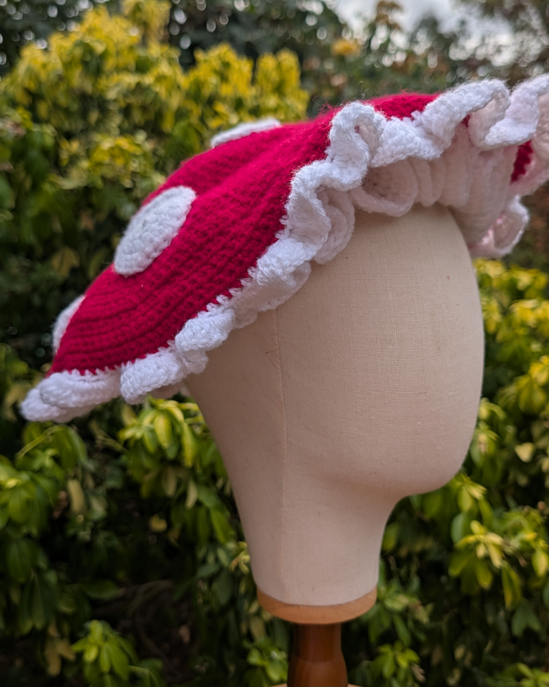 Red ruffle toadstool crochet hat
